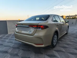  6 تويوتا كورولا 2021 لون شمباني بنزين اصلي ماتور cc1600 فحص كامل جمرك حديث