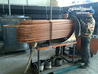  9 بويلرات بخار وتنكات ومداخن