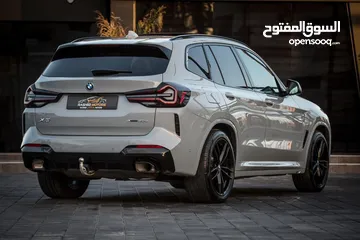  4 جيب BMW x3 M لون باطوني بنزين وكهرباء