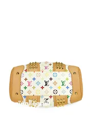  3 Louis Vuitton Pre-Owned 2000s Courtney MM two-way bag