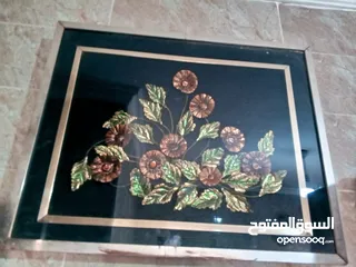  16 لوحات  رسم زيتي.. وتطريز