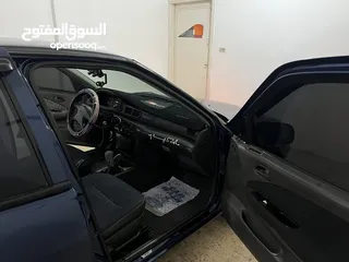 22 كيا سيفيا لون ازرق ميتالك نظيفه مع جنط 15 مميز كاوشوك وكاله غرفه نطيفه بطاريه جديده لسى كفالتها معها