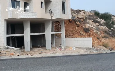  1 محلات مع سدد الشارع الرئيسي ضاحية الريحان