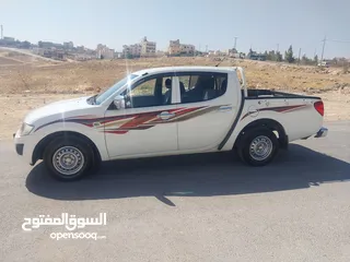  4 ميتسوبيشي L200 موديل 2015 بنزين بحاله الوكاله للبيع