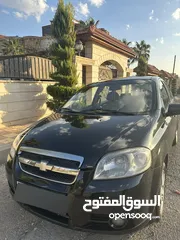  7 شفروليه افيو 2009 أسود ميتاليك للبيع بسعر مغري مؤمنة ومرخصة وليست بحاجة لأي نوع من الصيانة