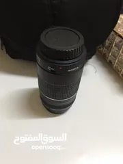  4 عدسة Canon  75-300 بحالة الوكالة مع الغطاء الأمامي والغطاء الخلفي