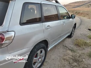  16 ميتسوبيشي اوت لاندر 2003