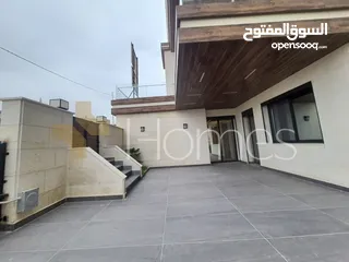  4 شقق مع حديقة للبيع في رجم عميش بمساحة بناء 221م