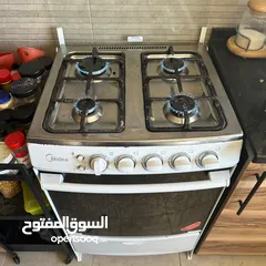  1 غاز وفرن ميديا اربع شعلات وشوايه بحاله ممتازه للبيع
