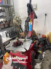  1 Air compressor and tire removal racks for sale بيع رفوف وكمبريسر وجهاز فك الاطارات