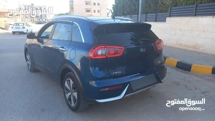  2 كيا نيرو لون كحلي فحص 2 جيد بسعر مغري قابل للبدل