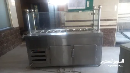  1 ثلاجة سلطات و غاز عينتين