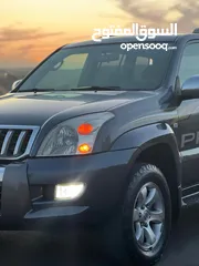 4 تويوتا برادو جيب موديل 2005  ليمتد من فحص كامل بحالة الشركة فل عدا الفتحة ممشى قليل لون فيراني بحالة