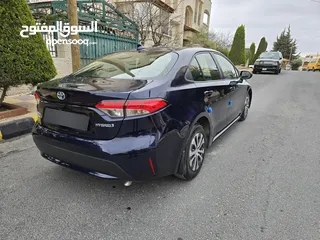  8 تويوتا كورولا 2021 ياباني بطارية ليثيوم قطعت مسافه 30 الف جمرك جديد بسعر مغري جدا