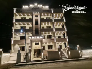  4 شقق 170م+205م للبيع على شارع البترا شرق اربد مول قراند وكازيه الرجوب