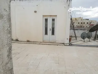  14 عمارة 4 طوابق للبيع في حي نزال على دونم ارض تحتوي 8 شقق وروف من المالك