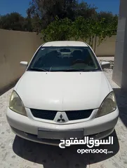  1 ميتسوبيشي لانسر موديل 2011 للبيع