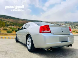  8 لعشاق الفخامة والتميز  دوج تشارجر 2009 مميزة جدا للبيع او البدل