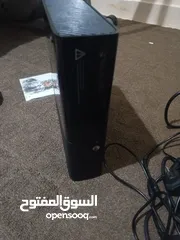  8 xbox 360E  معدله فيها فوق ال30لعبه  اقراء الوصف