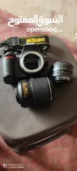  3 كاميرا نيكون 3100/D التفاوض بسعر قليل