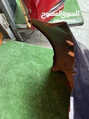  8 طمبون خلفي بريوس سي 2012-2014  اصلي معدل مستعمل بحالة جيده موضوح بصور  Toyota Prius c 2012-2015