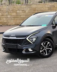  8 كيا سبورتاج هايبرد 2023 / فل كامل مع بانوراما وفرش مميز غرفه عسليه / عداد قليل / سعررر مميز جداً