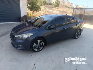  10 كيا سيراتو موديل 2014 ما شاء الله فول اضافات فتحة سقف حساس امامي خلفي شركة ليد امامي وخلفي سبويلرات