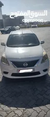  4 Nissan sunny  - white -  2014