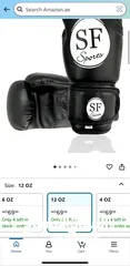  2 قفازات ملاكمه مع خوذه ملاكمه استعمال بسيط لا يوجد بها اي عيب ففف  boxing gloves with a boxing helmet