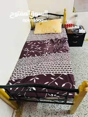  1 Bed and mattress with side table