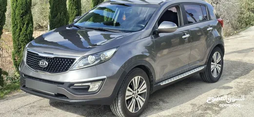  2 جيب كاياسبورتاج موديل 2014-اتومتيك'دفع 4×4 ماتور 2000ديزل فل فل اضافات ماعد الفتحة - نظيف من الاخر