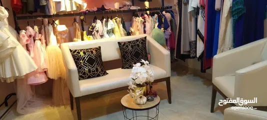  2 محل ملابس  سهره ستاتي واطفال مع مخيطه للبيع بكافه معداتها للبيع