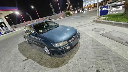  26 اوبل اوميجا للبيع السياره ب حاجه ل صيانه (القير + صنوبرصات) كاوشك جديد كراسي كهرباء السياره فحص خالي
