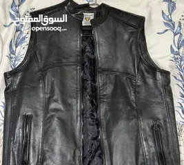  1 Original leather Biker’s vest and various helmets