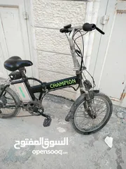  1 بسكليت كهربائيّ CHAMPION 36ڤولت بطارية 10 امبير مع شاحنها الاصلي  السعر: 600