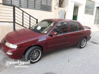  4 كيا سيفيا ون موديل 1995 لون خمري جير عادي للبيع