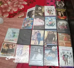  4 ب5 دنانير DvD جهاز مع رموت و 32 فلم سيدي ديفيدي