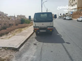  1 بكم ميتسوبيشي كانتر موديل 2003 فحص كوشوك جديد ترخيص جديد