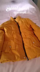  1 سترة شتويه ممتازه لونها اصفر