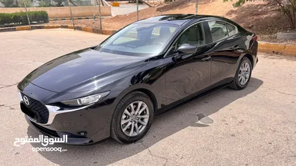  9 مازدا زوم 3 SkyActive مايلد هايبرد 2023 وارد الخياط عداد 43 ألف فقط كرت ابيض