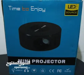  4 mini projectot led بروجكتير صغير الحجم