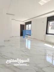  9 شقة أرضية فاخرة للبيع في خلدا  - خلف المستشفى السعودي 330م مع حديقة وترسات 100م لم تسكن