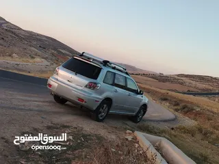  14 ميتسوبيشي اوت لاندر 2003