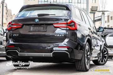  6 BMW IX3 2024 M kit full Electric   عداد صفر