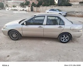  4 لانسر موديل 2005 قير عادي متور 1300