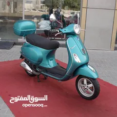  6 Vespa 150 lx
