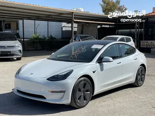  2 Tesla model 3 2023 لون آبيض لؤلؤي