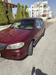  4 نيسان صني خصوصي اصلي 2010 ياباني موتور 1600 سي سي لون خمري داخلية لون بيج