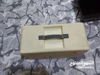  10 ماكنه خياطه سنجر مستعمله + طاولة كوي كبيره الحجم