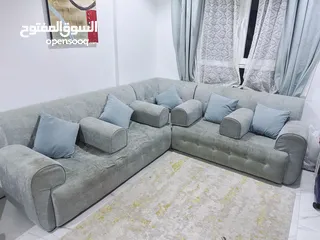  1 Sofa with 2 carpets in very good condition